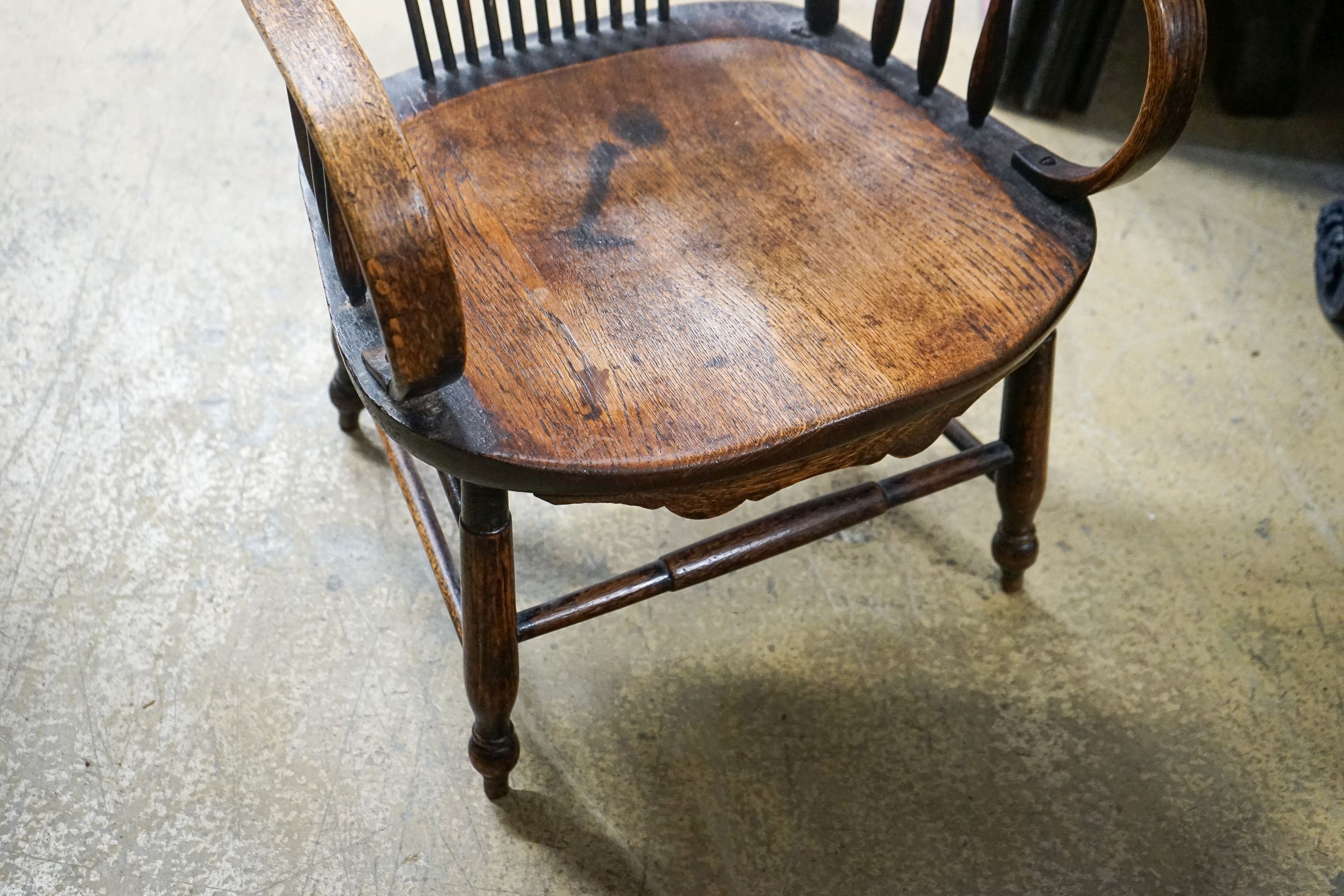 An early 20th century American ash and oak elbow chair, width 52cm, depth 42cm, height 100cm